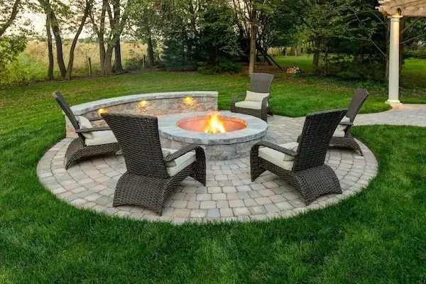 besthomegear.com image of round fire pit with pavers and chairs