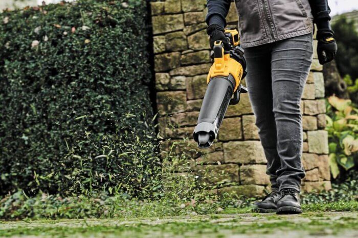 image of man using a DeWalt Blower